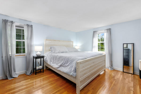 882 West Yarmouth Road Yarmouth Port, MA 02675 - Photo 21 of 36 a bedroom with a bed and window