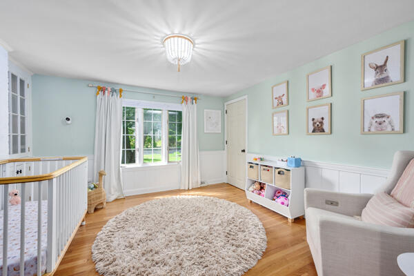882 West Yarmouth Road Yarmouth Port, MA 02675 - Photo 24 of 36 a living room with furniture and a table