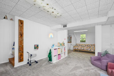 a room with furniture and window