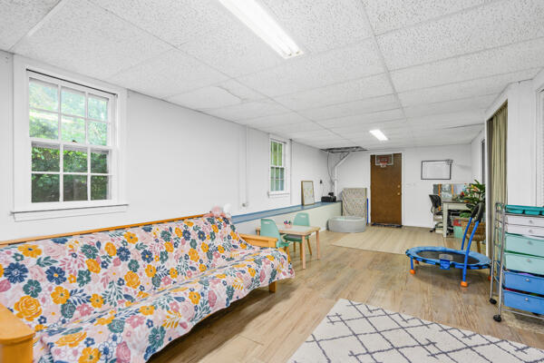 882 West Yarmouth Road Yarmouth Port, MA 02675 - Photo 28 of 36 a bedroom with furniture and a window