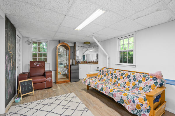 882 West Yarmouth Road Yarmouth Port, MA 02675 - Photo 29 of 36 a bedroom with furniture and a window