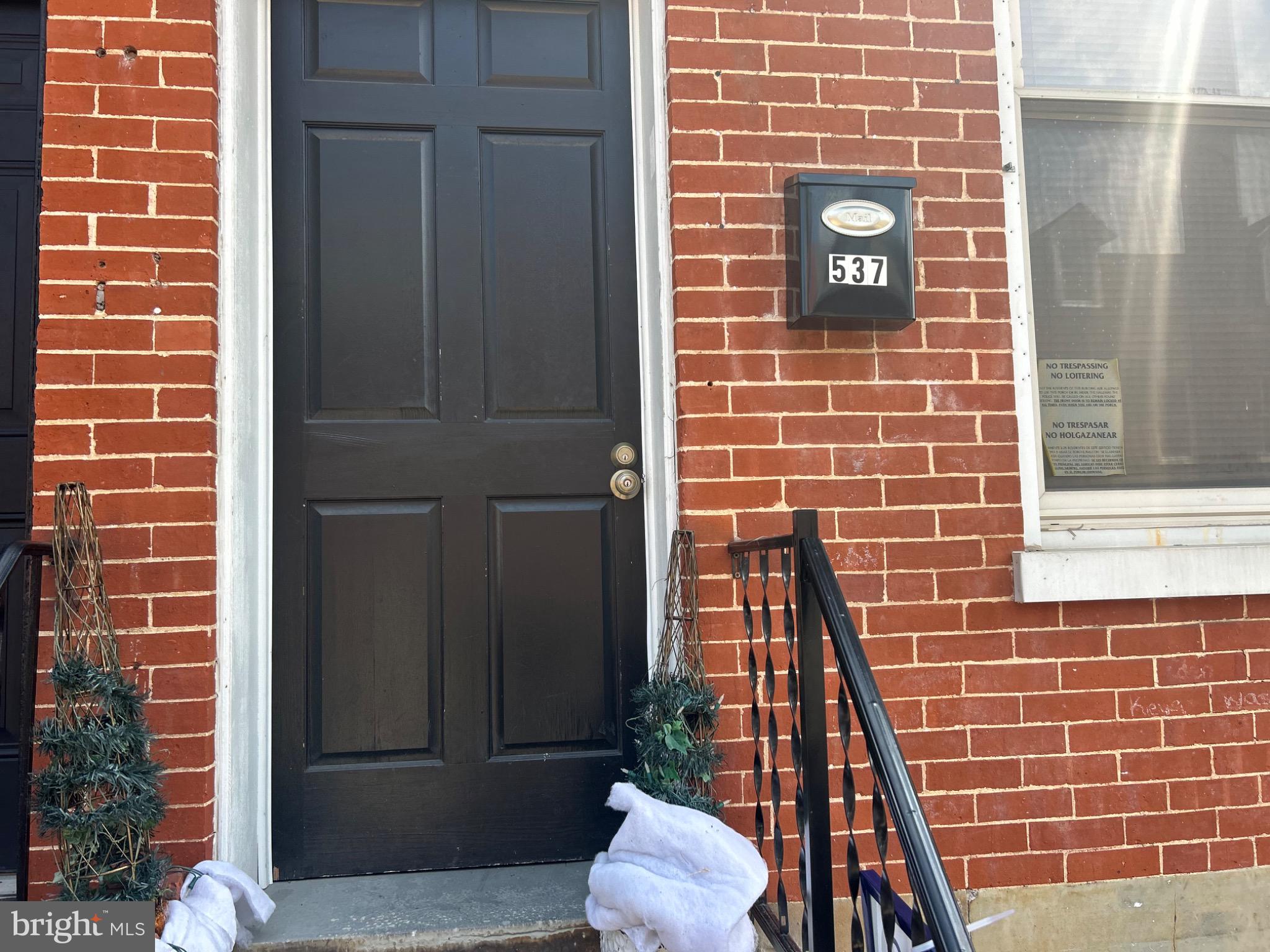 537 South Duke Street York, PA 17401 - Photo 6 of 17 a view of a door with brick wall