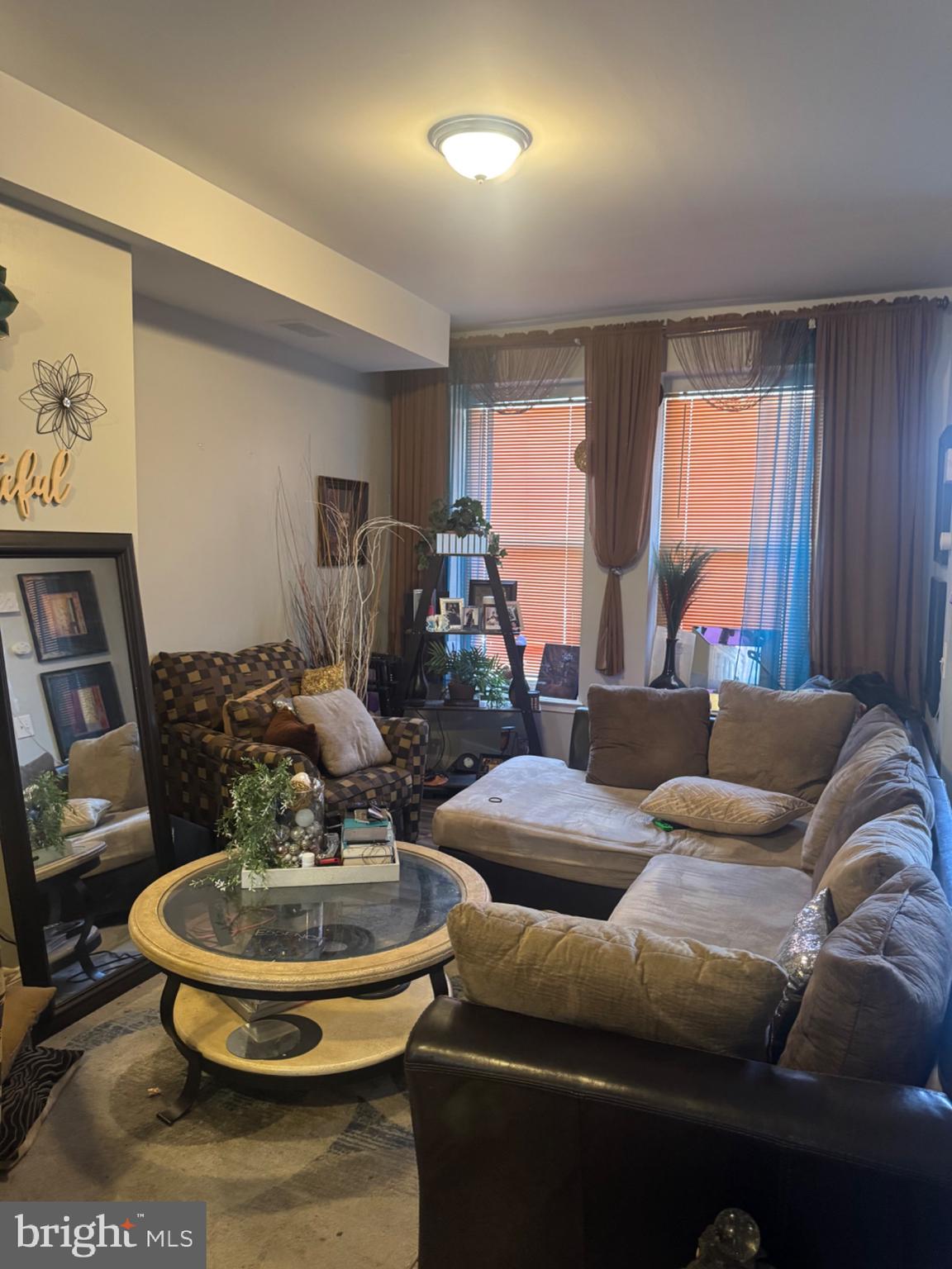 537 South Duke Street York, PA 17401 - Photo 9 of 17 a living room with furniture and a large window