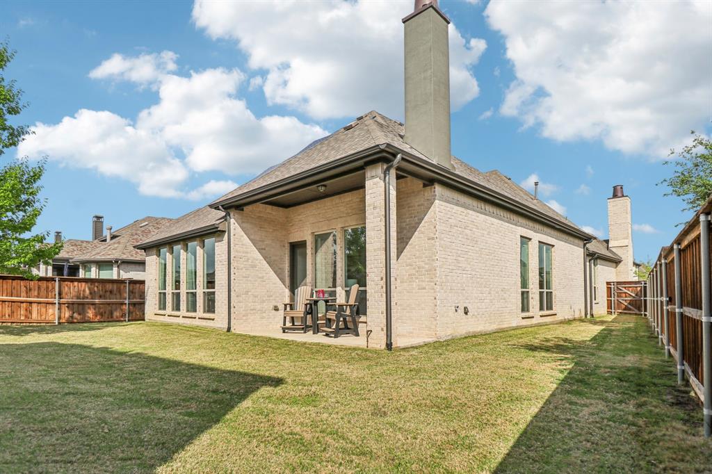 8277 Halifax The Colony, TX 75056 - Photo 37 of 37 a view of a house with backyard and garden