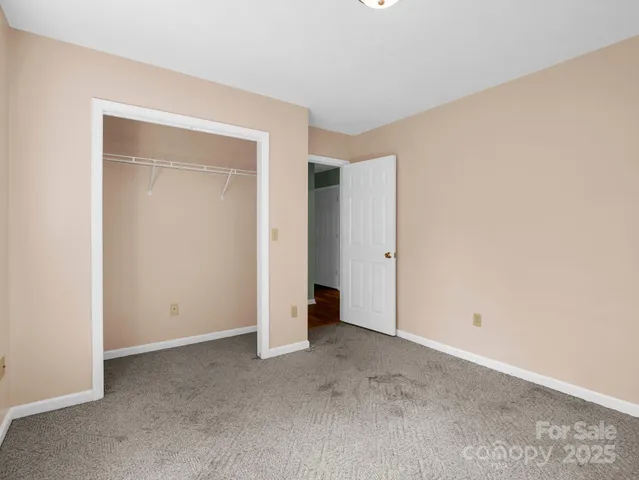 a view of storage and utility room with racks on the wall