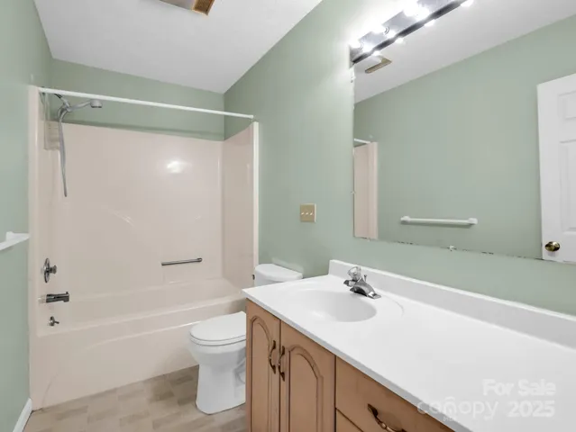 a view of a room with a large window