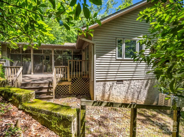 a backyard of a house with seating space