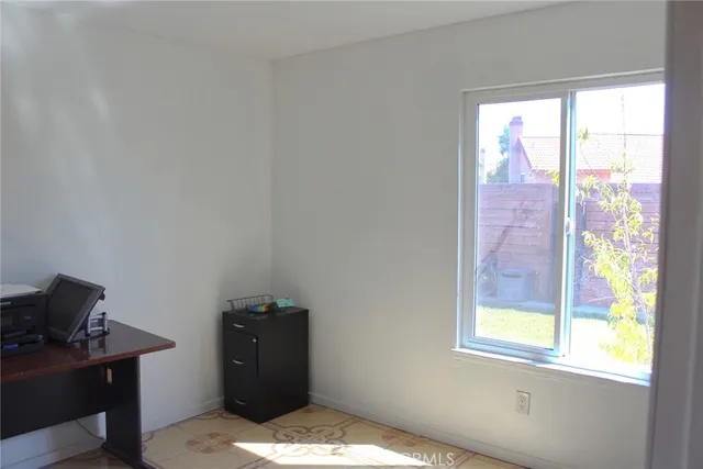 a bedroom with a window