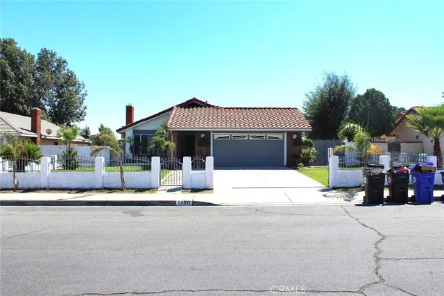 a view of a house with a street