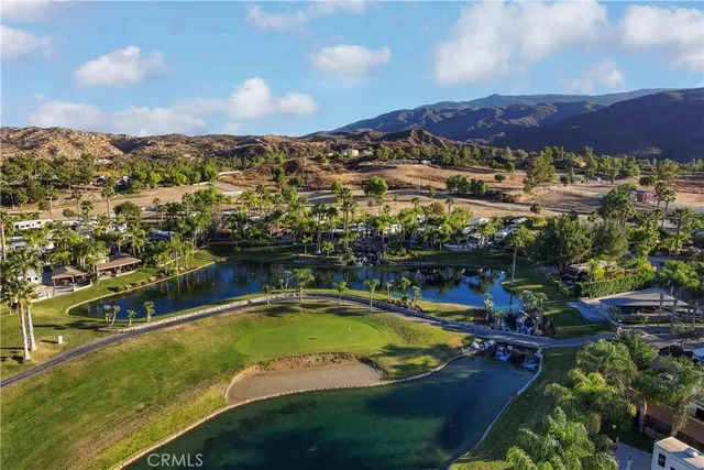 a view of a swimming pool with a lake view
