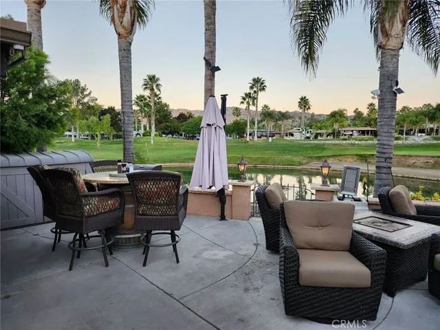 a view of a swimming pool with a patio