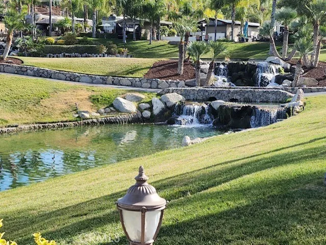 a view of a swimming pool with a patio