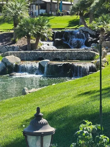 an aerial view of residential house with outdoor space and swimming pool