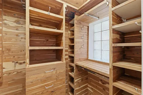 a bathroom with a toilet sink and shower