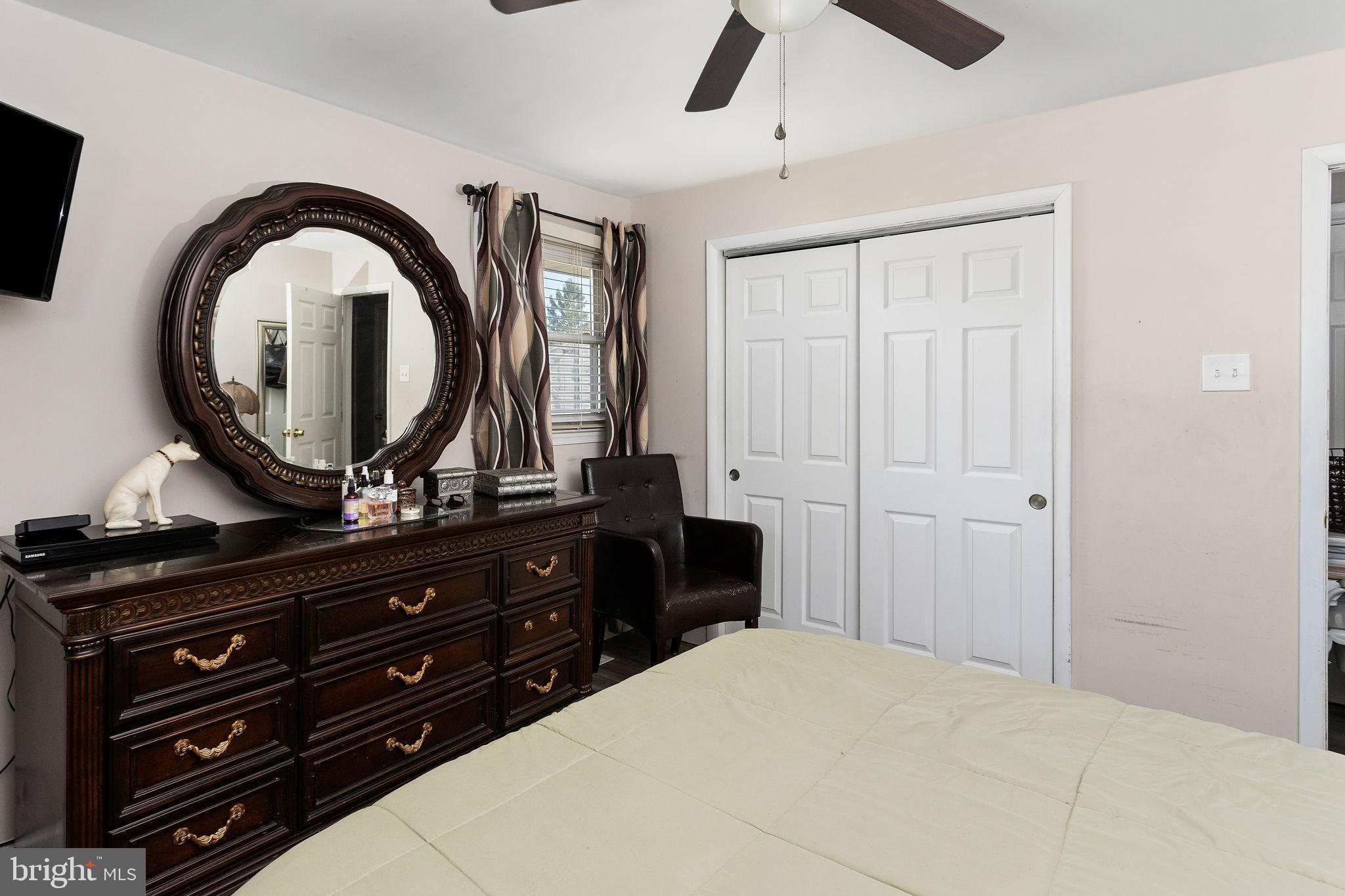 19 Spruce Road Burlington, NJ 08016 - Photo 13 of 27 a bedroom with a bed and a dresser