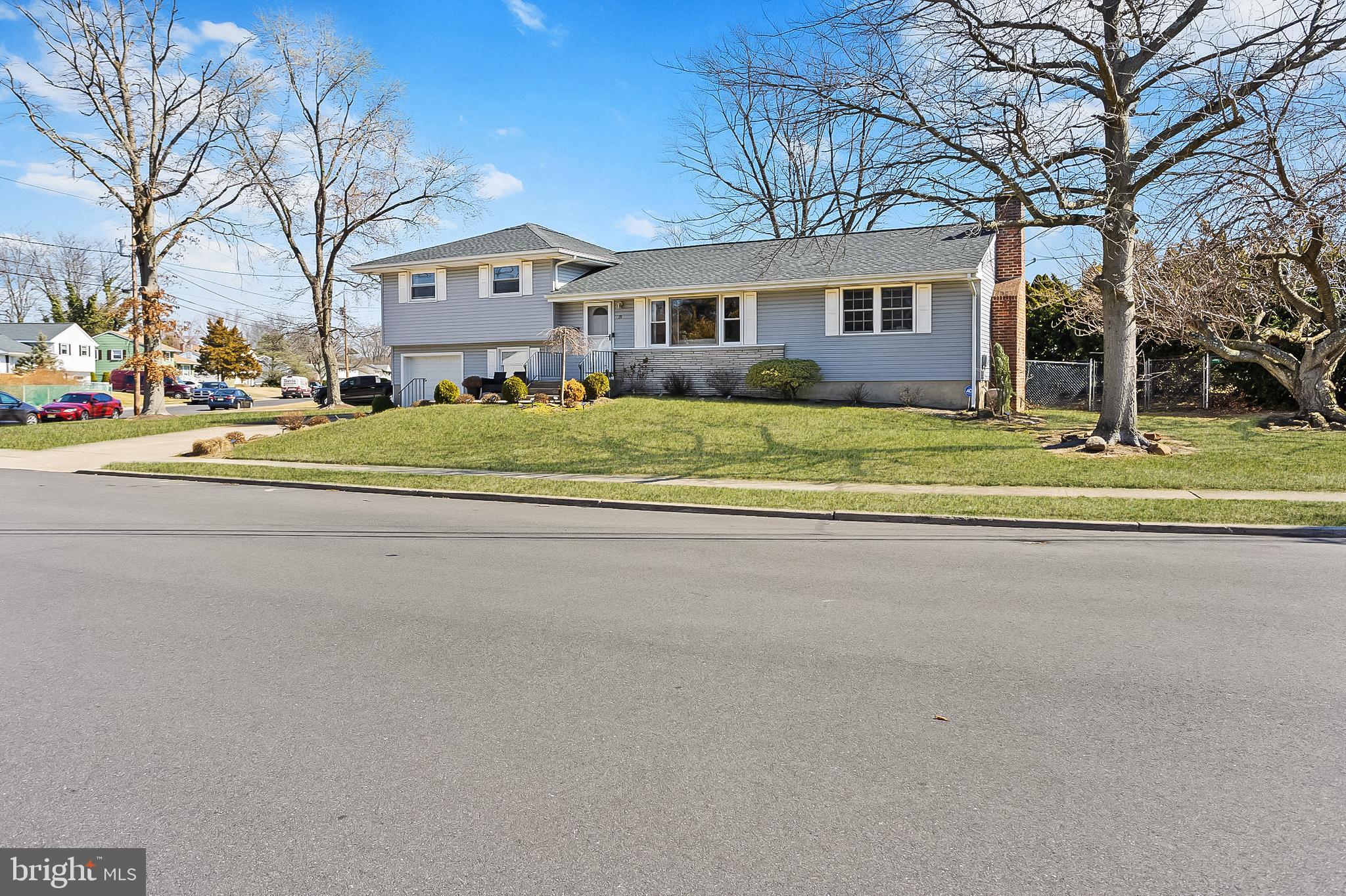 19 Spruce Road Burlington, NJ 08016 - Photo 2 of 27 a view of a house with a big yard and large trees