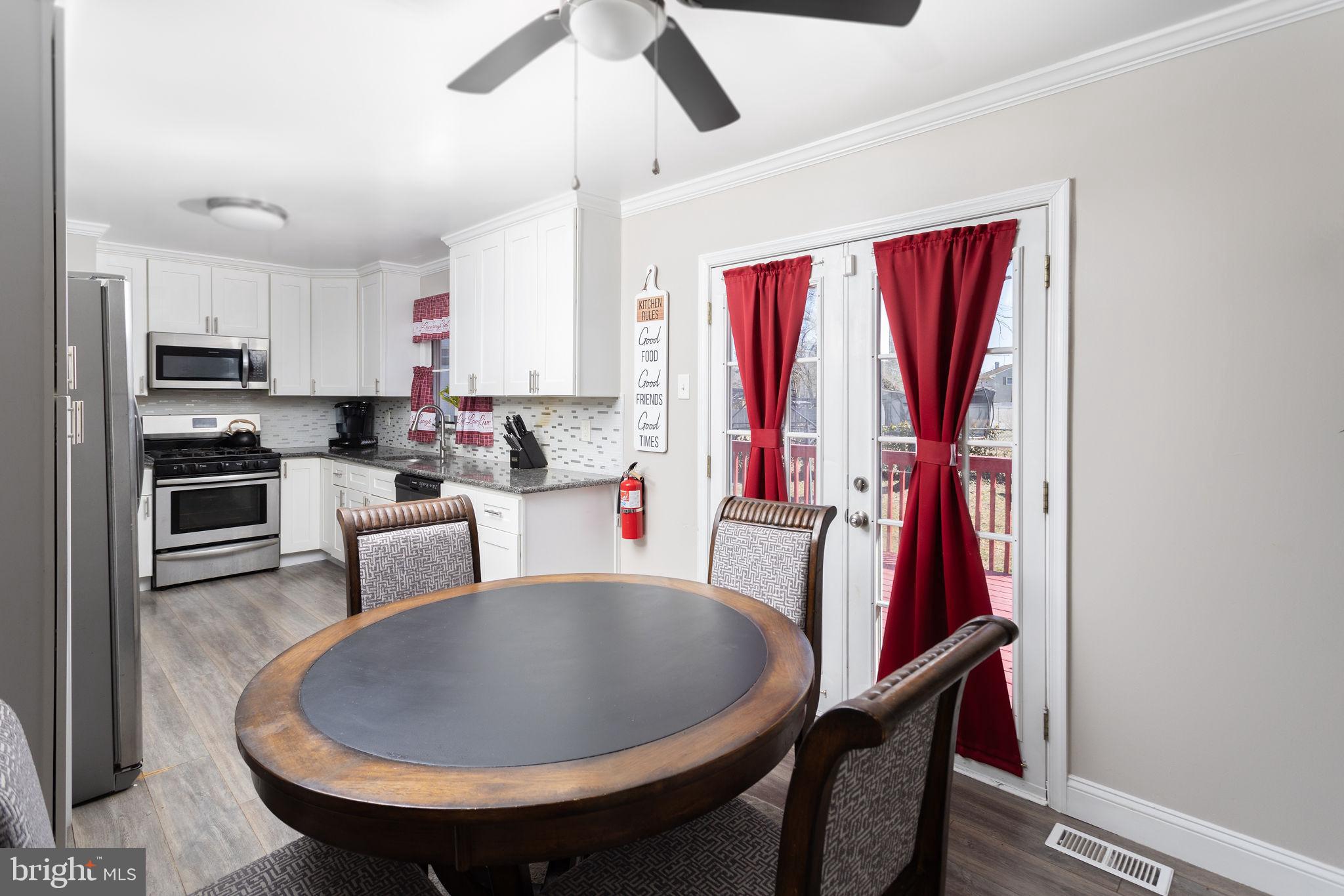 19 Spruce Road Burlington, NJ 08016 - Photo 8 of 27 a view of a dining room with furniture