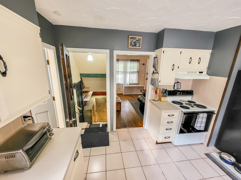77 Olean Street Worcester, MA 01602 - Photo 33 of 42 a view of a hallway with workspace and a window