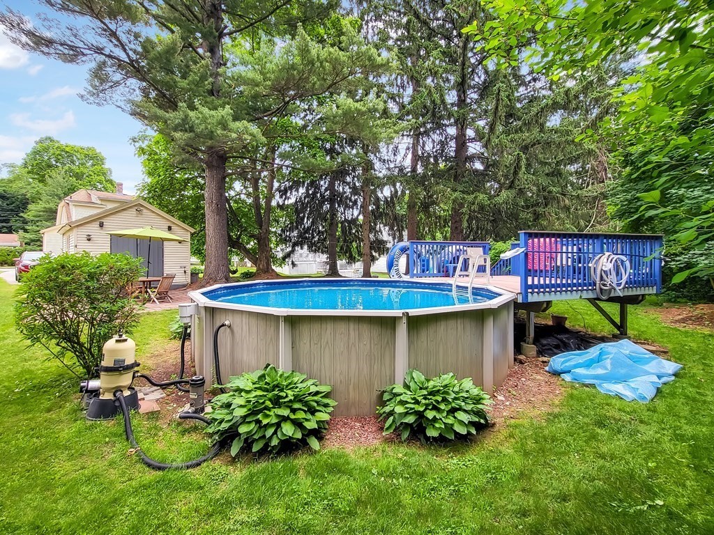 77 Olean Street Worcester, MA 01602 - Photo 6 of 42 a view of a house with a yard and sitting area