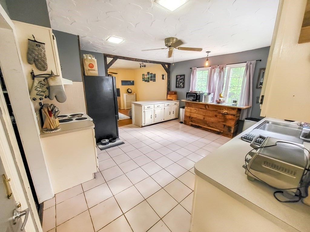 77 Olean Street Worcester, MA 01602 - Photo 10 of 42 a bedroom with furniture and a window