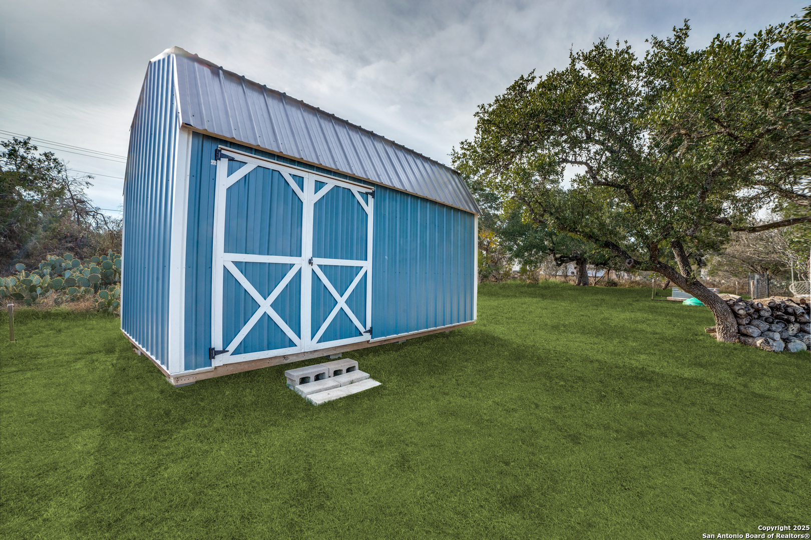 388 Bluff View Drive Spring Branch, TX 78070 - Photo 25 of 25 a front view of a house with garden
