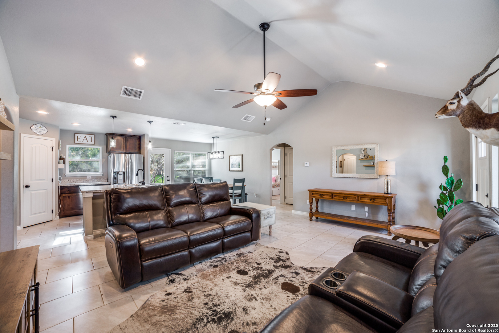 388 Bluff View Drive Spring Branch, TX 78070 - Photo 8 of 25 a living room with furniture and a chandelier