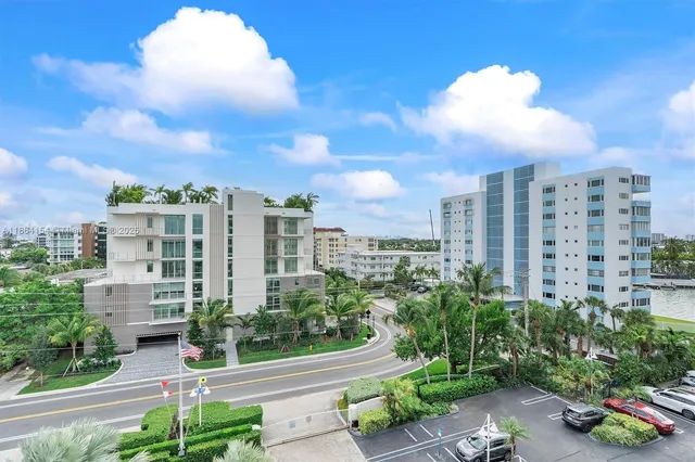 a view of a water with a building in the background