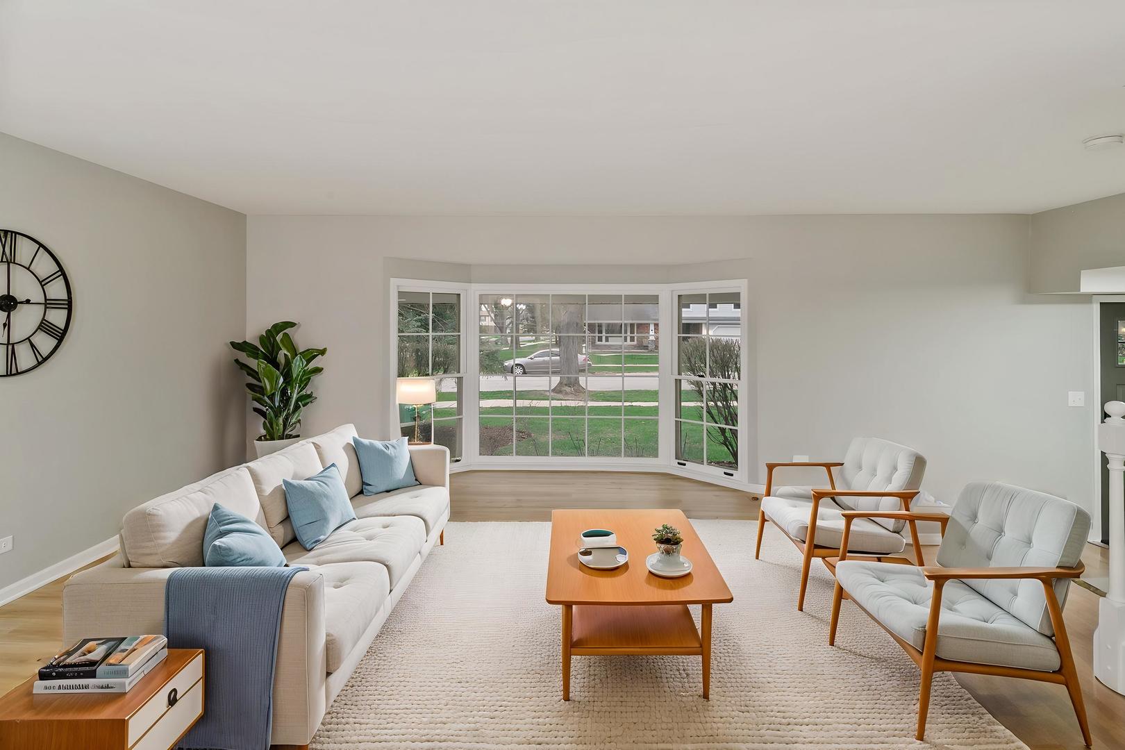 1554 Chickasaw Drive Naperville, IL 60563 - Photo 11 of 32 a living room with furniture and a large window