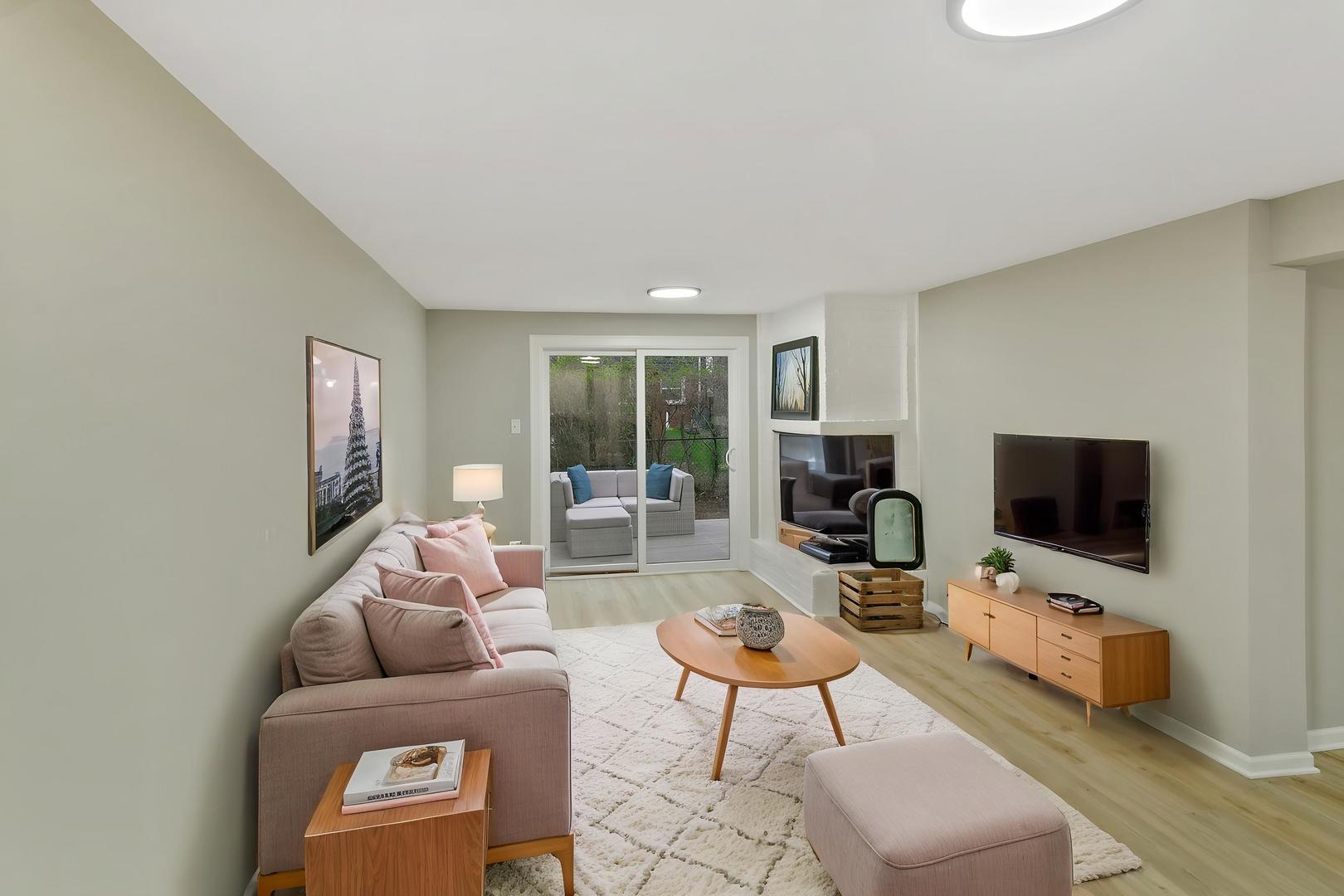 1554 Chickasaw Drive Naperville, IL 60563 - Photo 13 of 32 a living room with furniture and a flat screen tv