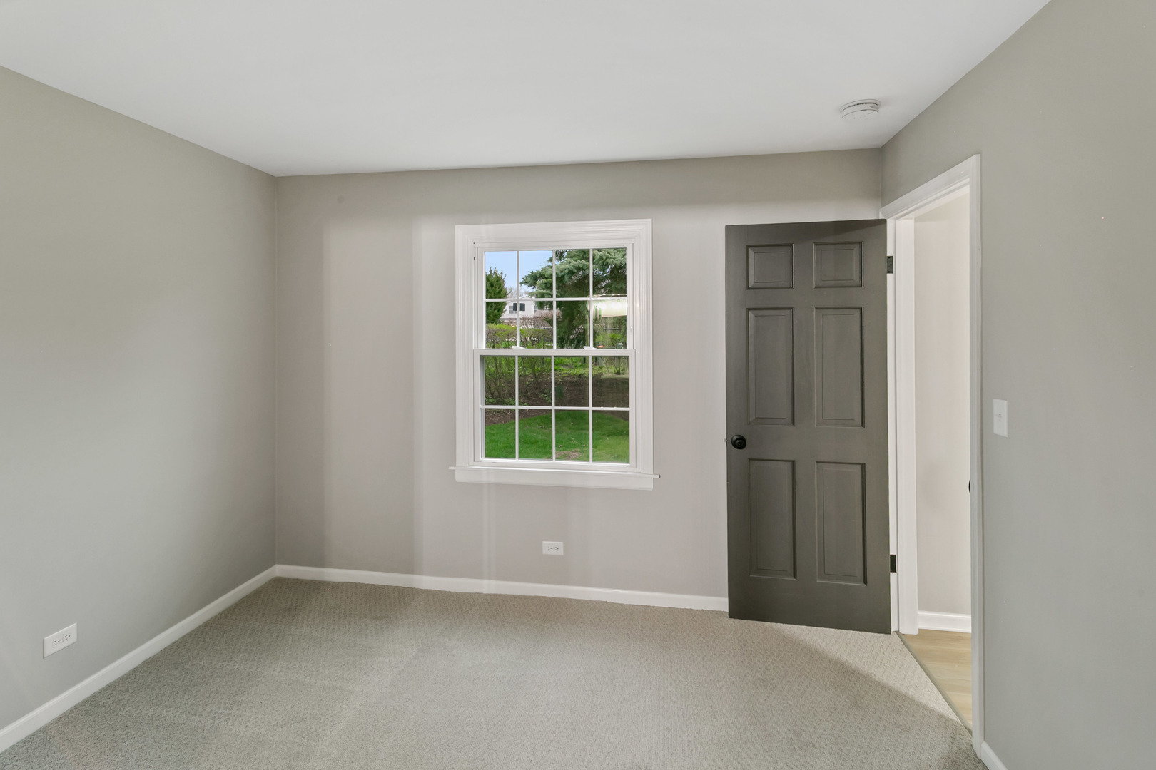 1554 Chickasaw Drive Naperville, IL 60563 - Photo 18 of 32 an empty room with a window