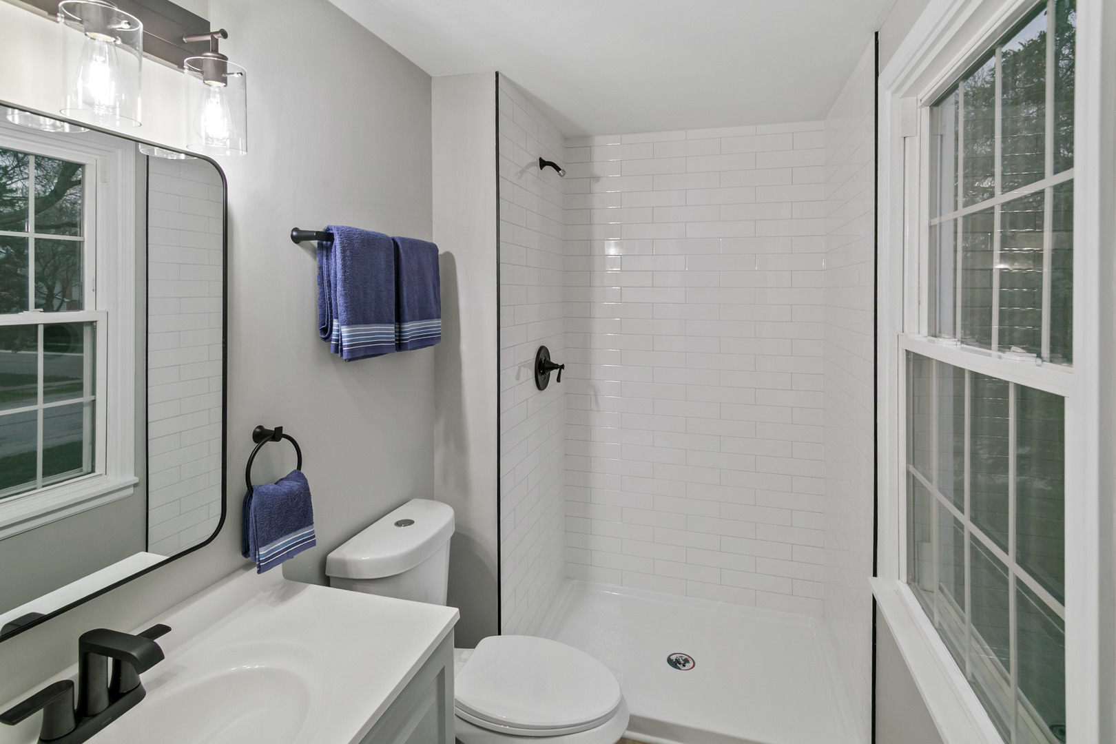 1554 Chickasaw Drive Naperville, IL 60563 - Photo 26 of 32 a bathroom with a toilet sink and shower