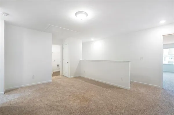 an empty room with an entryway