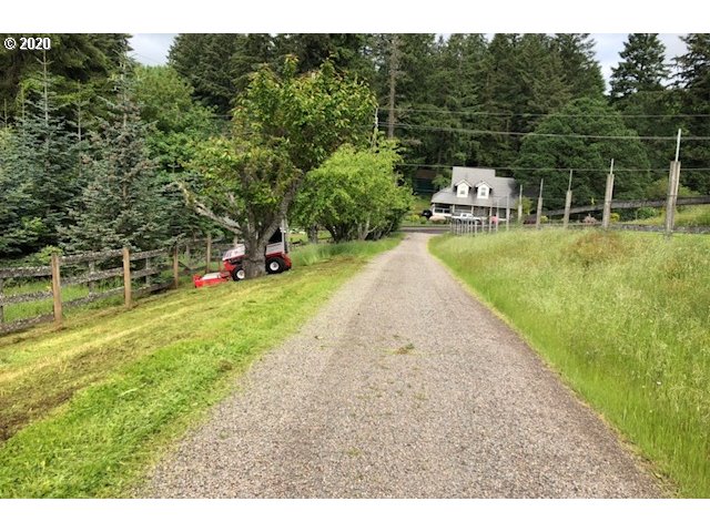 26400 Southwest Petes Mountain Road West Linn, OR 97068 - Photo 6 of 32 a view of a house with a yard