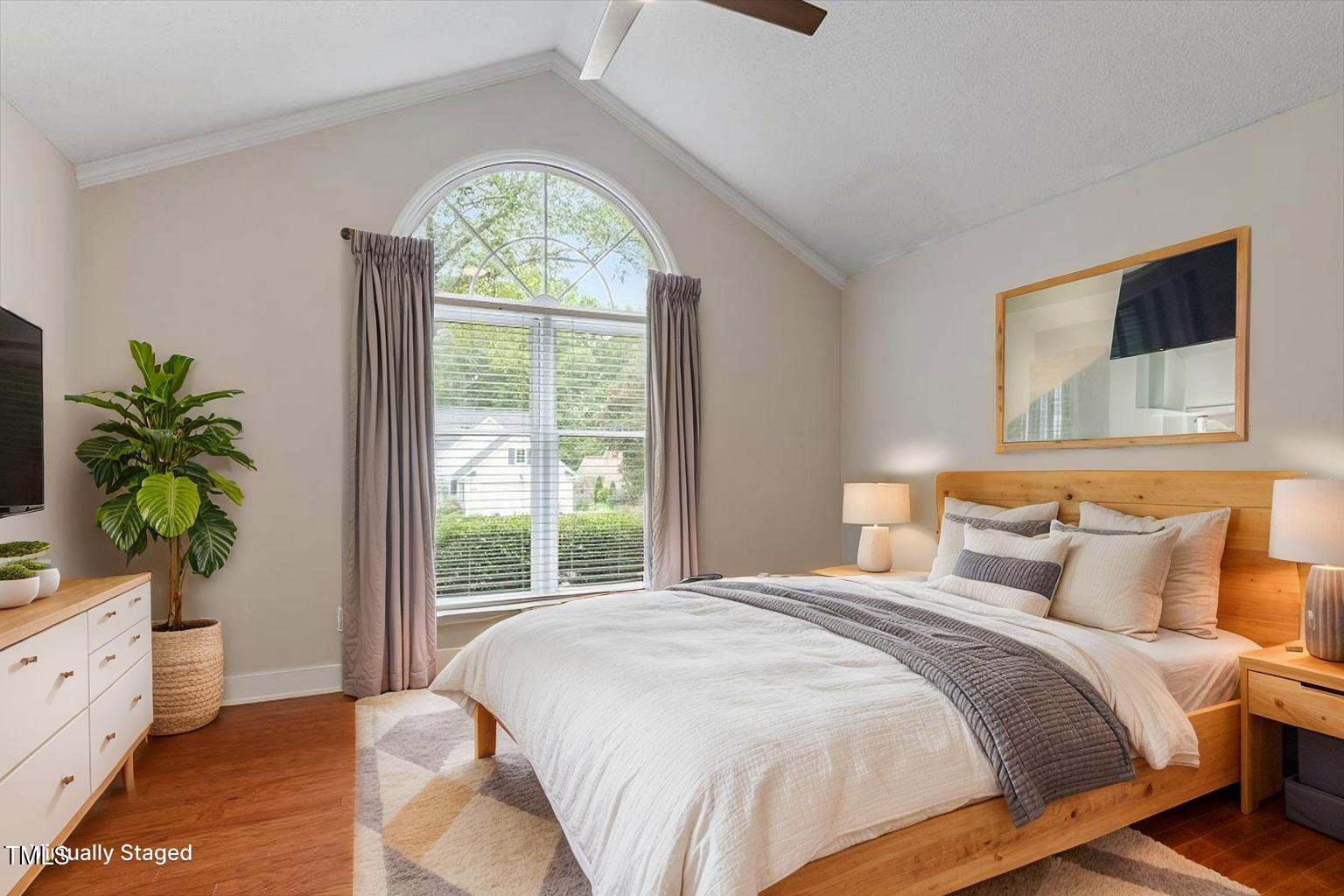 5821 Edgebury Road Raleigh, NC 27613 - Photo 15 of 37 a bedroom with a bed and a window