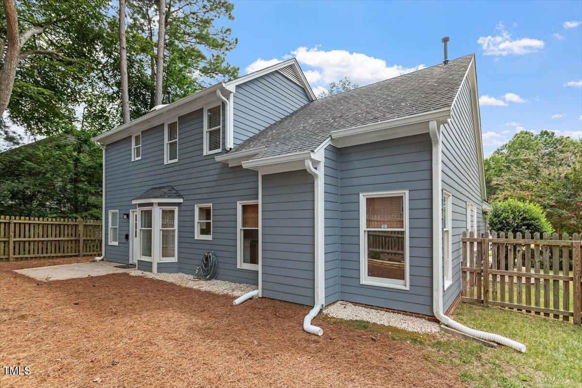 5821 Edgebury Road Raleigh, NC 27613 - Photo 27 of 37 a backyard of a house with barbeque oven
