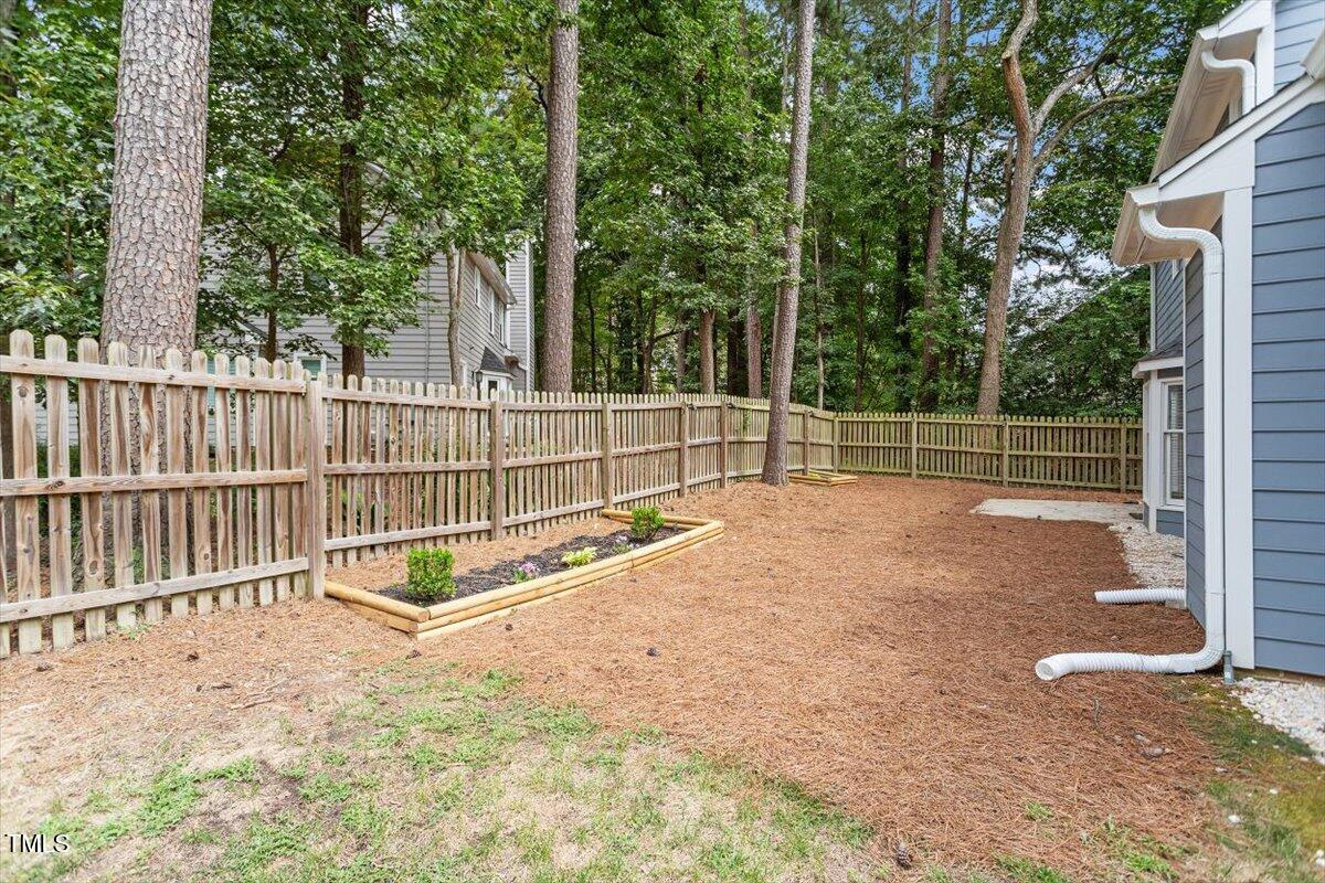 5821 Edgebury Road Raleigh, NC 27613 - Photo 29 of 37 a view of a backyard