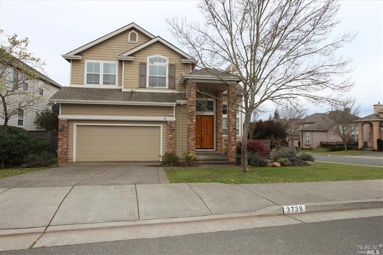 3738 Doverton Court Santa Rosa, CA 95404 - Photo 1 of 1 a front view of a house with a yard and garage