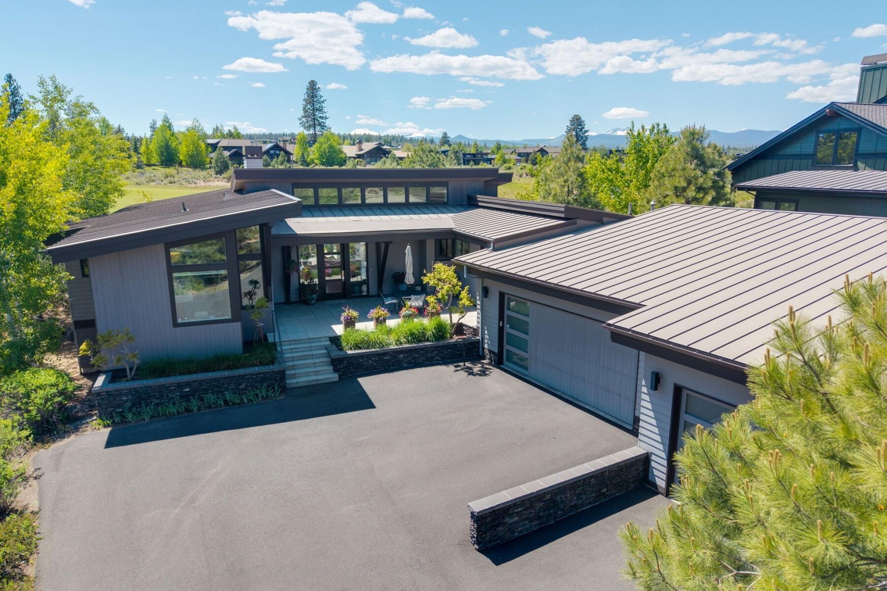 61487 Hackleman Court Bend, OR 97702 - Photo 1 of 35 a view of a house with a patio