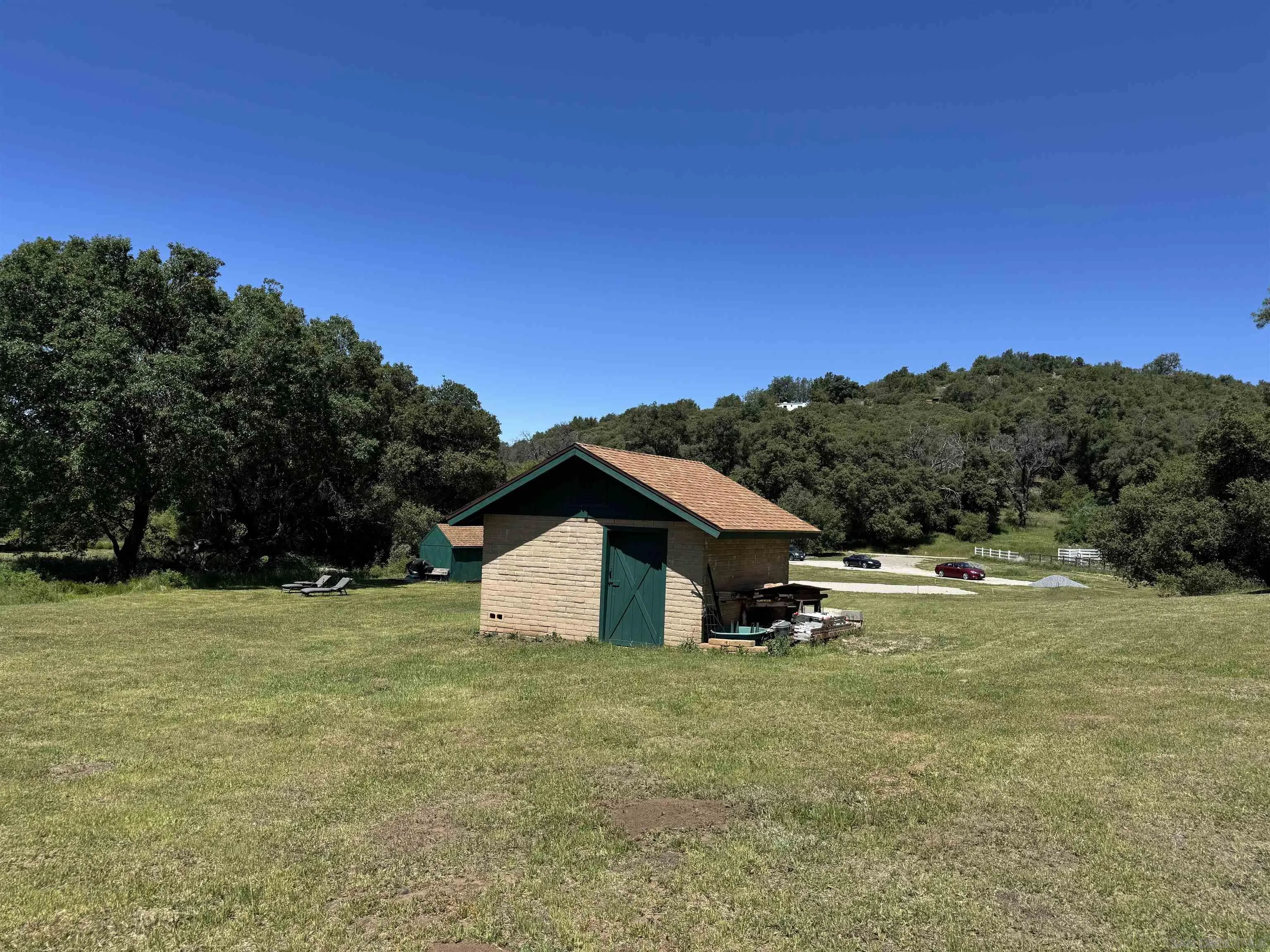 5750 Forest Meadow Road, Unit 1 Julian, CA 92036 - Photo 14 of 36 a view of a house with a yard