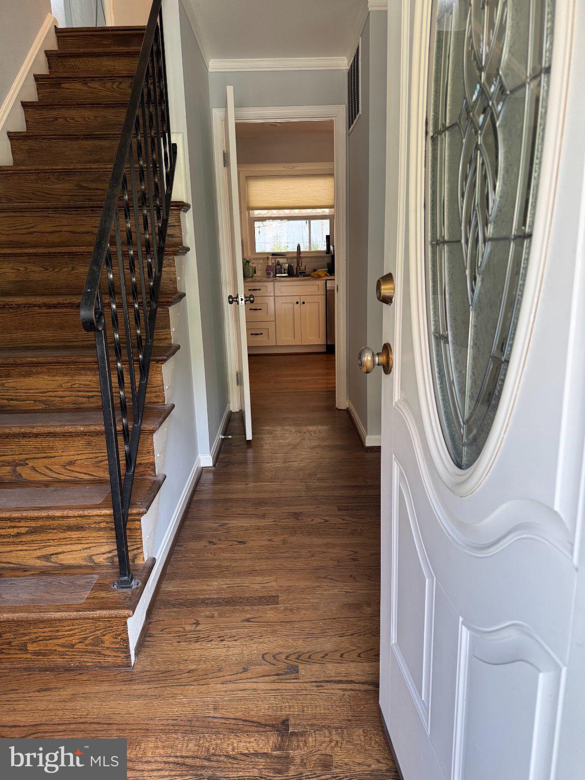 6603 Huntsman Boulevard Springfield, VA 22152 - Photo 3 of 64 Inviting entryway with elegant staircase.