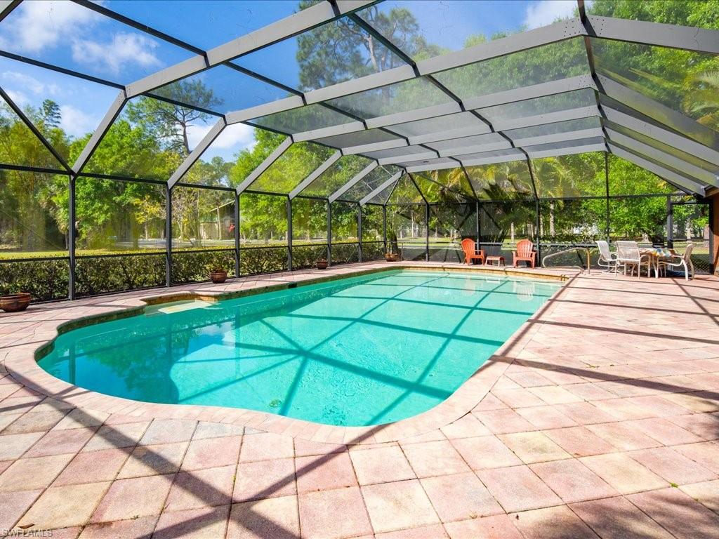 3890 27th Avenue Southwest Naples, FL 34117 - Photo 21 of 38 a view of outdoor space with seating