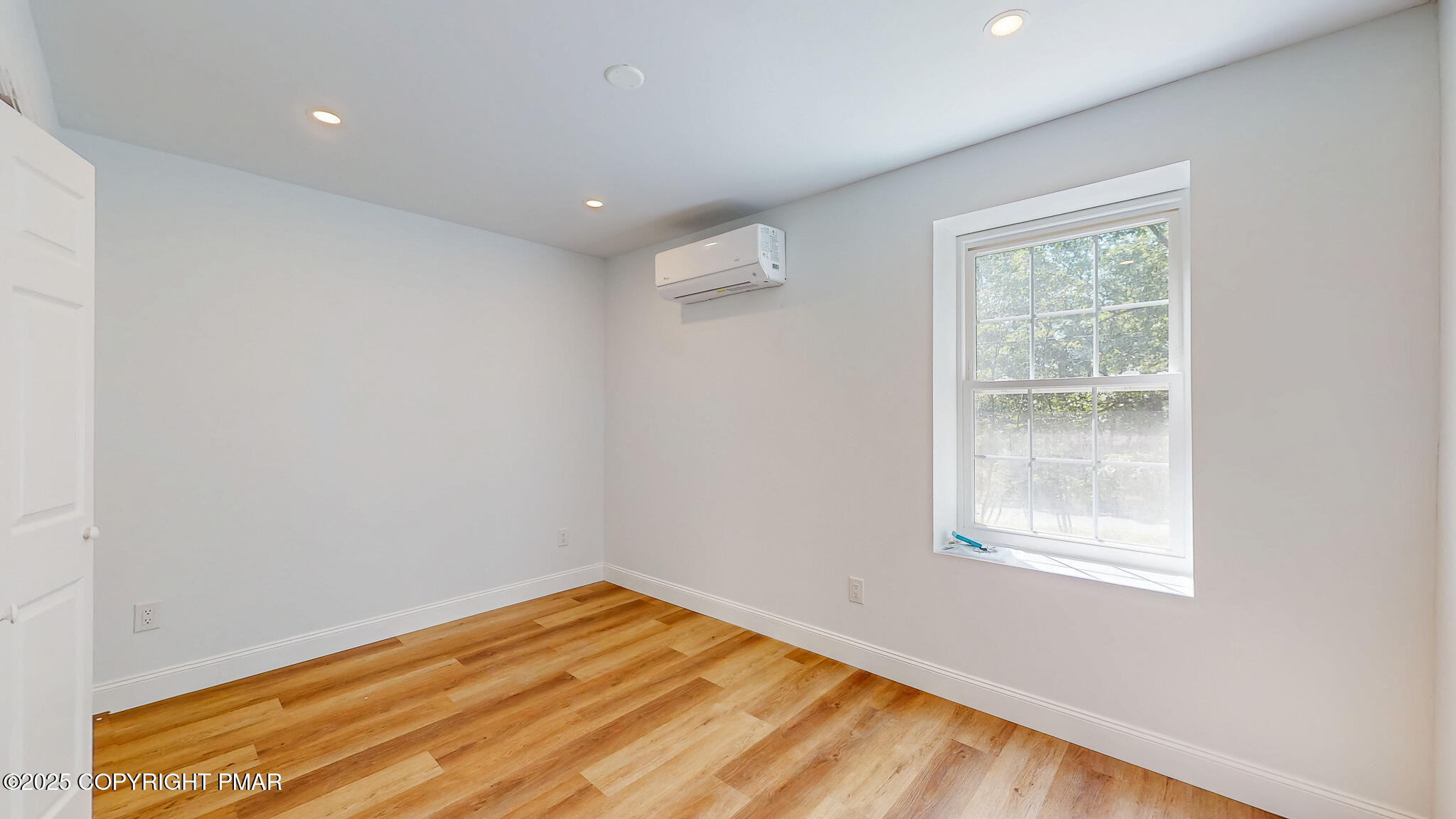 269 Stafford Drive Bushkill, PA 18324 - Photo 34 of 42 a view of empty room with wooden floor and fan
