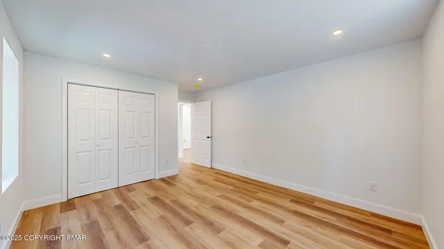 a bathroom with a sink toilet and vanity