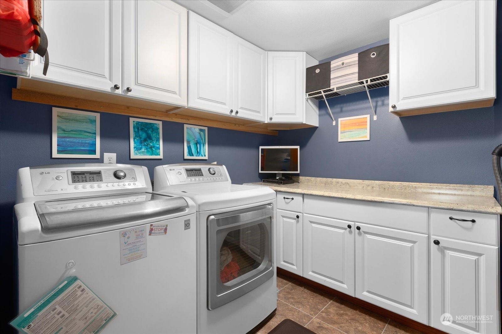 366 Twin Oaks Road Chehalis, WA 98532 - Photo 20 of 40 a utility room with stainless steel appliances granite countertop a sink and cabinets