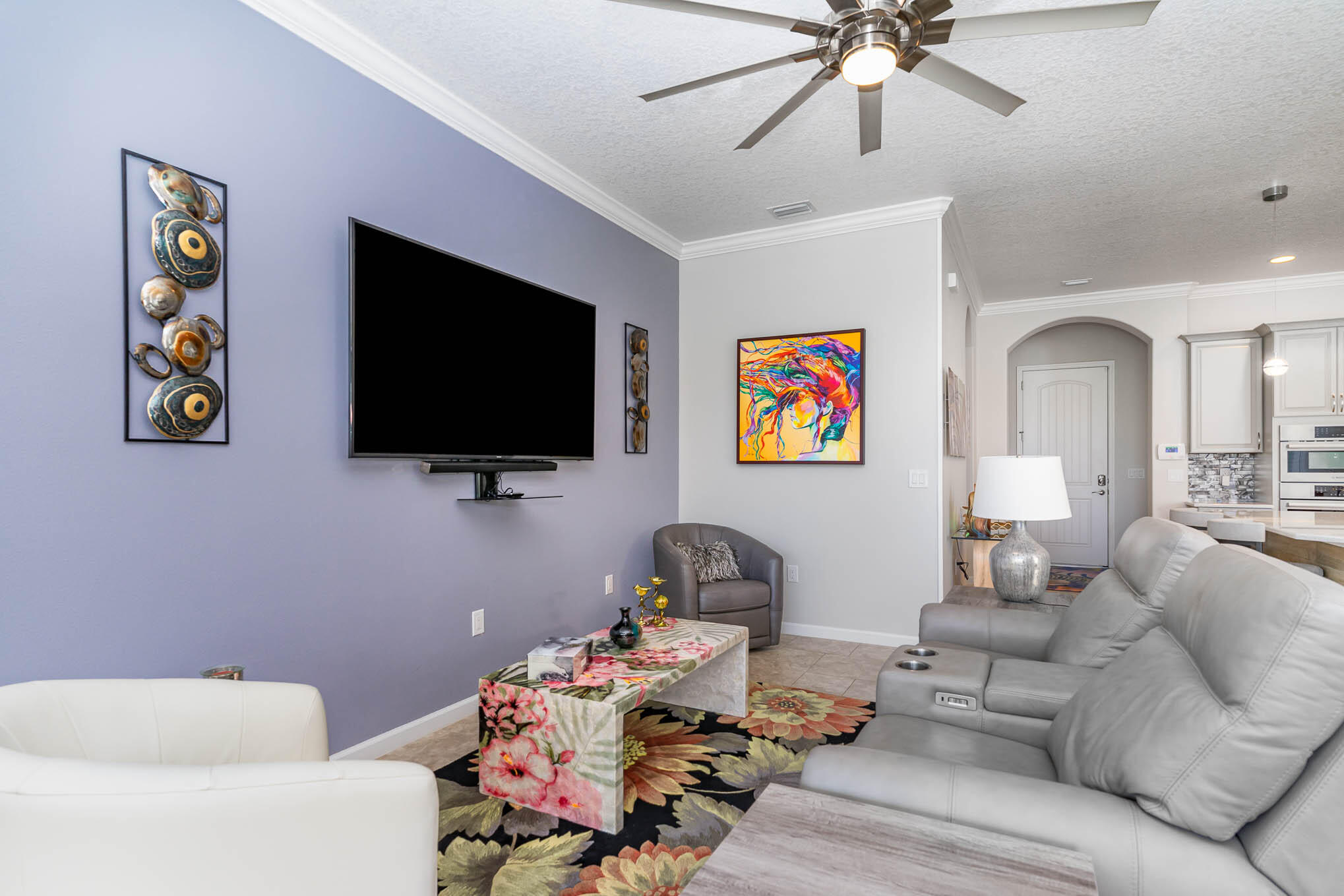 3750 Alamanda Key Drive Melbourne, FL 32901 - Photo 16 of 86 a living room with furniture and a flat screen tv