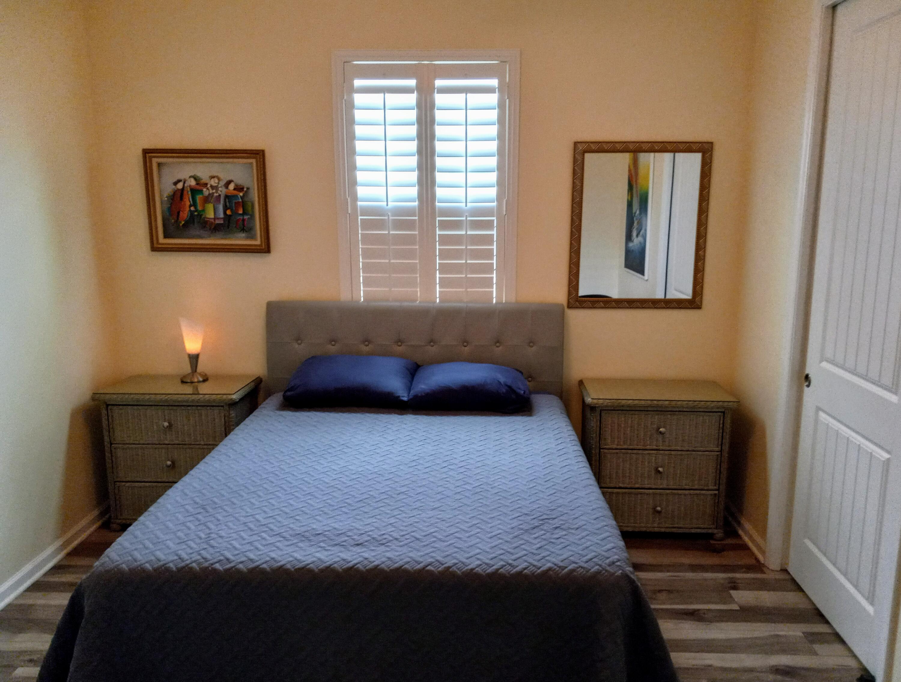 3750 Alamanda Key Drive Melbourne, FL 32901 - Photo 25 of 86 a bedroom with a bed and a window