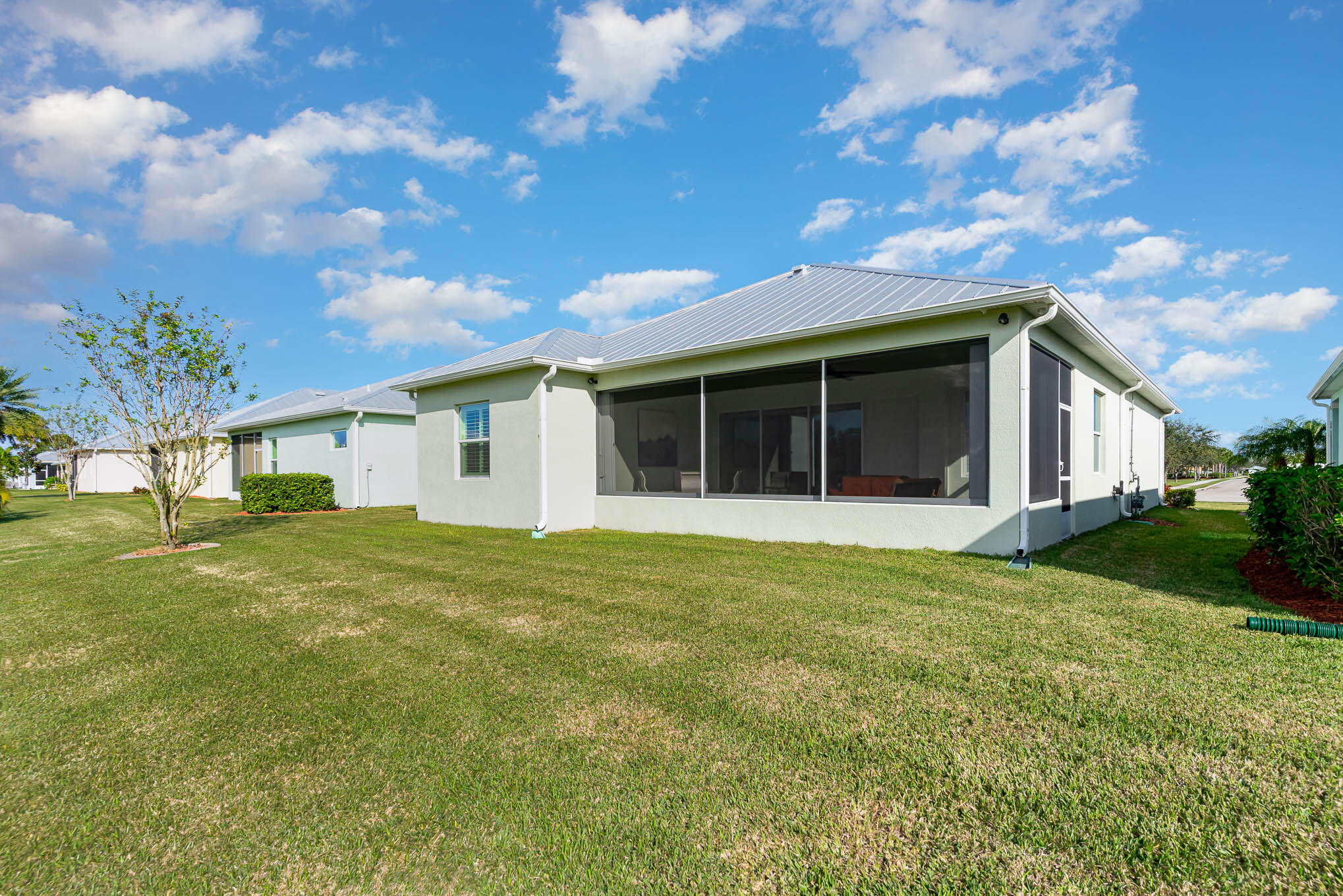 3750 Alamanda Key Drive Melbourne, FL 32901 - Photo 33 of 86 a view of a house with a garden