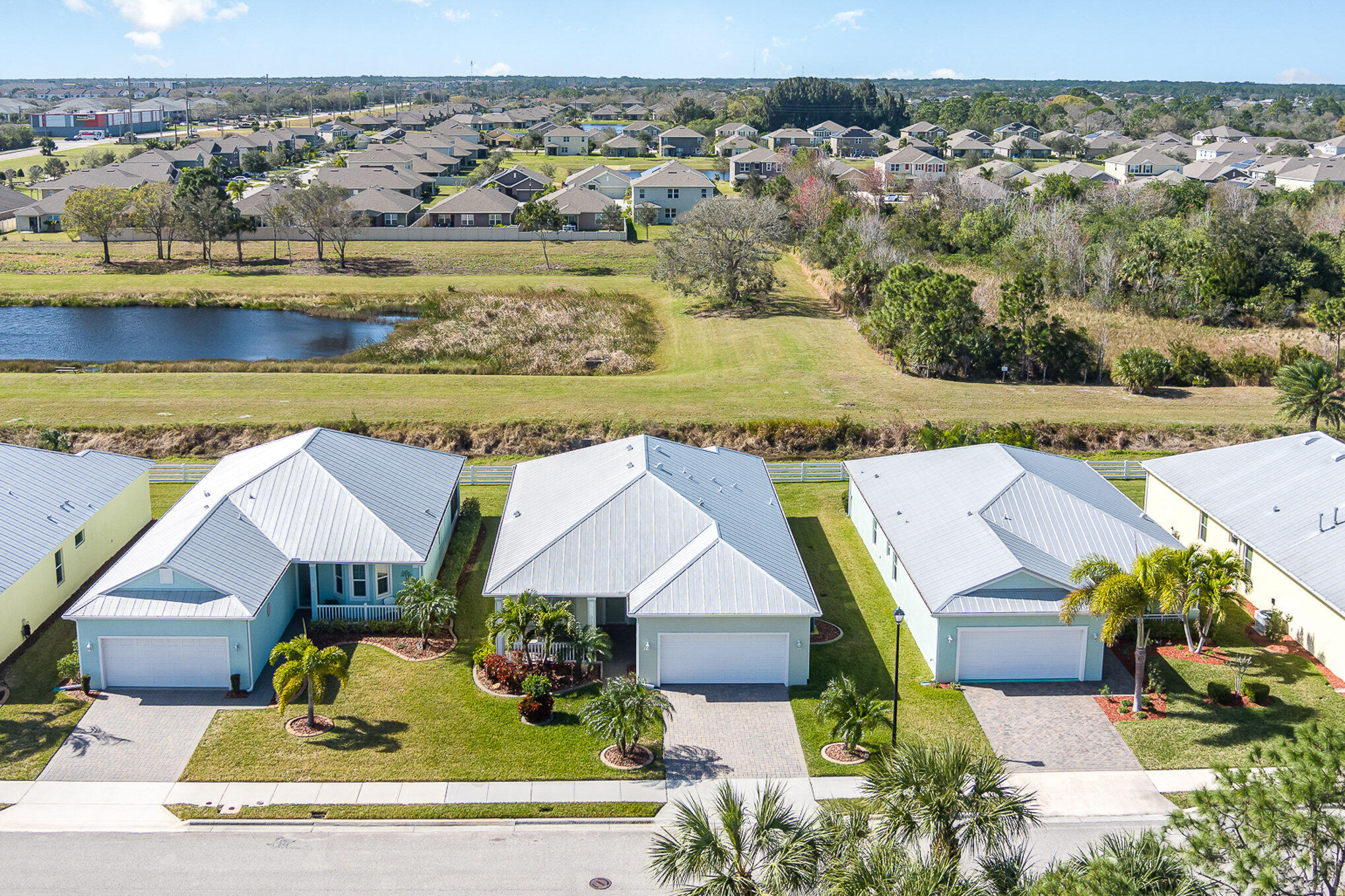 3750 Alamanda Key Drive Melbourne, FL 32901 - Photo 48 of 86 an aerial view of houses with yard