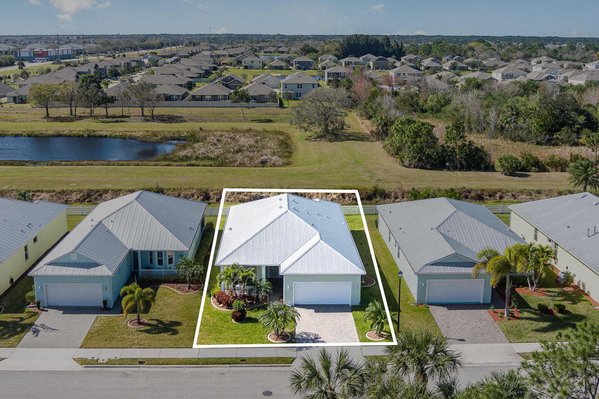 3750 Alamanda Key Drive Melbourne, FL 32901 - Photo 49 of 86 an aerial view of houses with yard