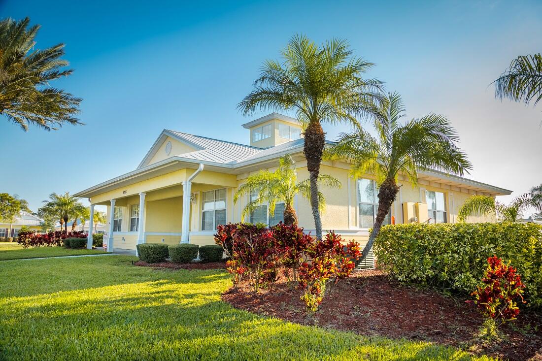 3750 Alamanda Key Drive Melbourne, FL 32901 - Photo 59 of 86 a front view of house with yard and outdoor seating